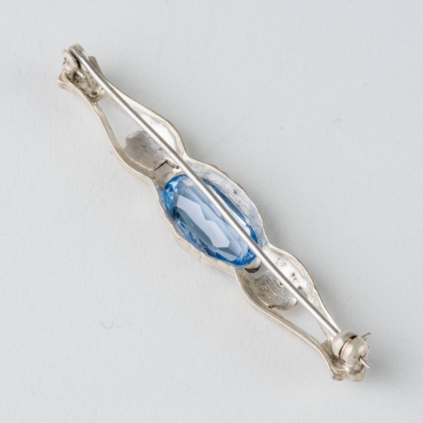 Brosche mit blauem Stein 835er Silber 5g2
